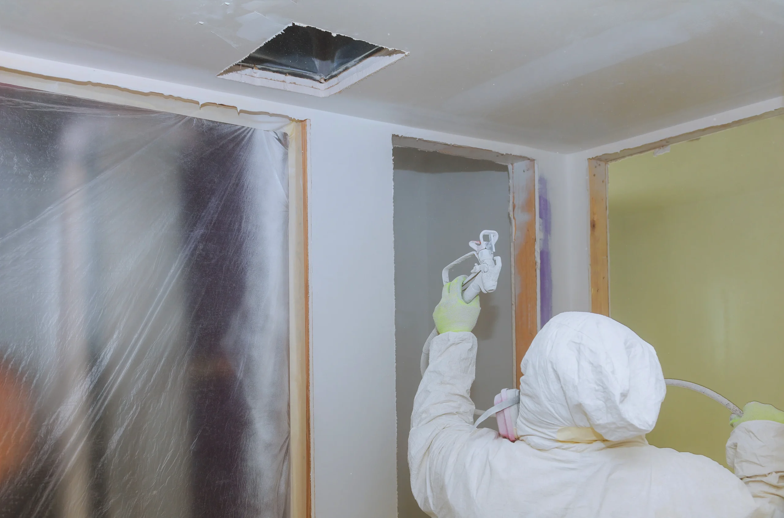 Using spray paint to paint room white